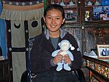 Mustang Lo Manthang 02 04 Future Kings Daughter And Beanie Baby I asked the Future King of Mustang if I could take a photo of his daughter with a beanie baby I had carried with me, and he called for her to come out. I spoke briefly to her and found out that as of 2008 she was 16 and just starting her A-levels in Kathmandu, where she lives with her father and 7-year old brother.